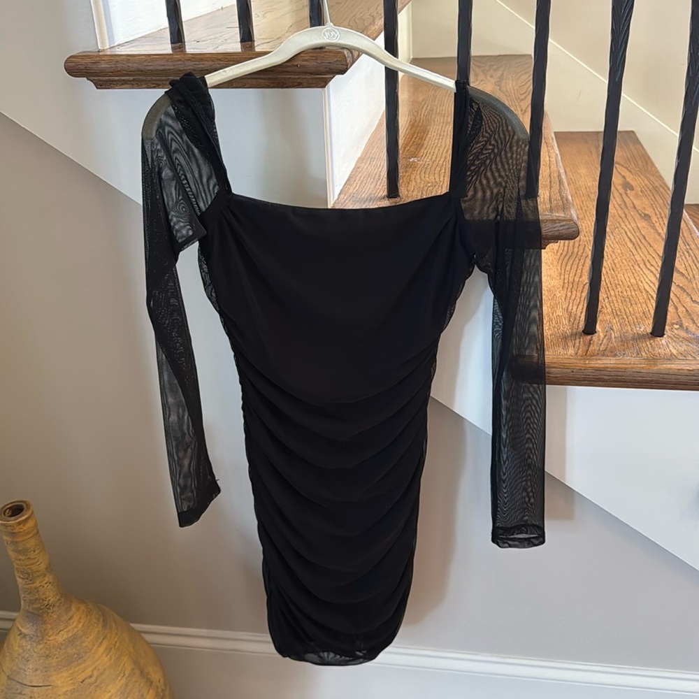 Princess Polly black mini rushed dress with mesh sleeves size 4.  Worn once.